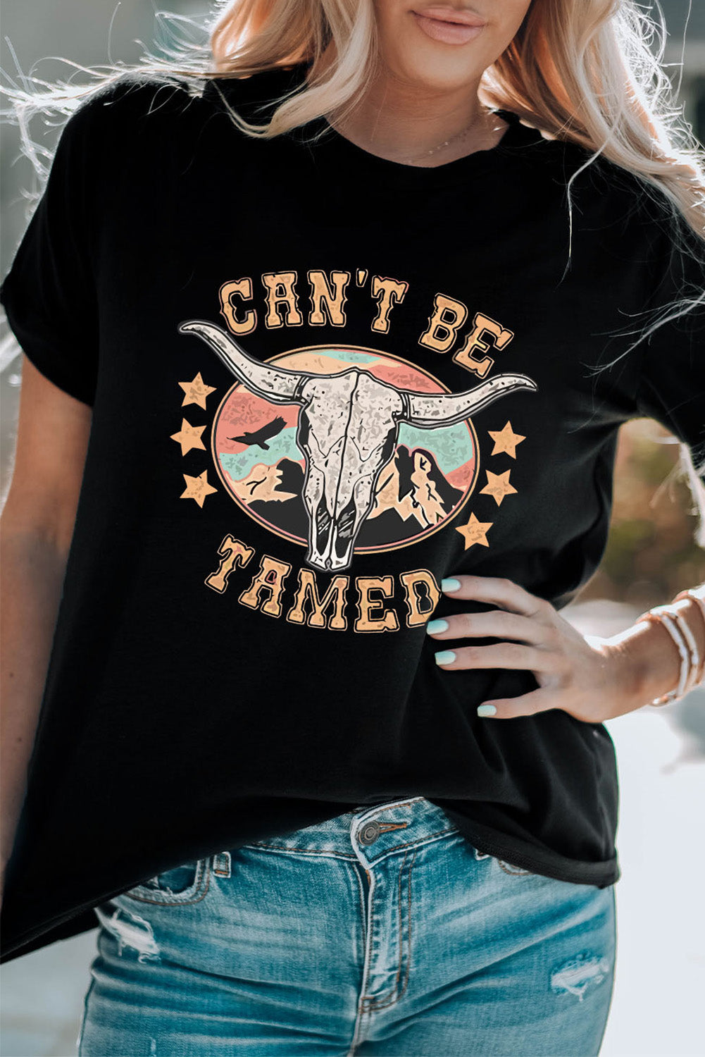 T-shirt à manches courtes avec imprimé graphique « CAN'T BE TAMED »