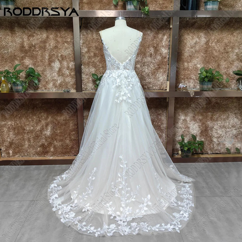 Robe de mariée pailletée à bretelles spaghetti – Robe de mariée bohème dos nu à col en V avec appliques et traîne