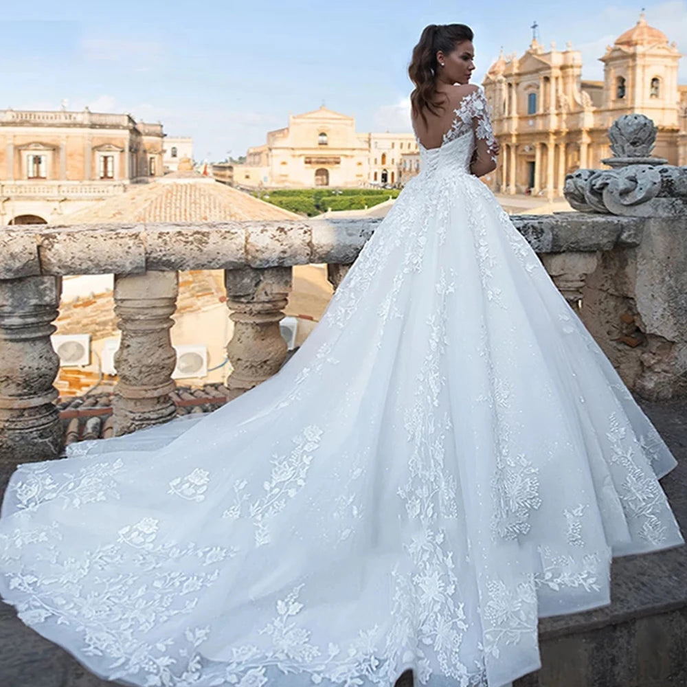 Elegantes Hochzeitskleid 2023 – Illusion Langärmliges V-Ausschnitt-Spitzen-Brautkleid mit rückenfreiem Prinzessinnen-Design